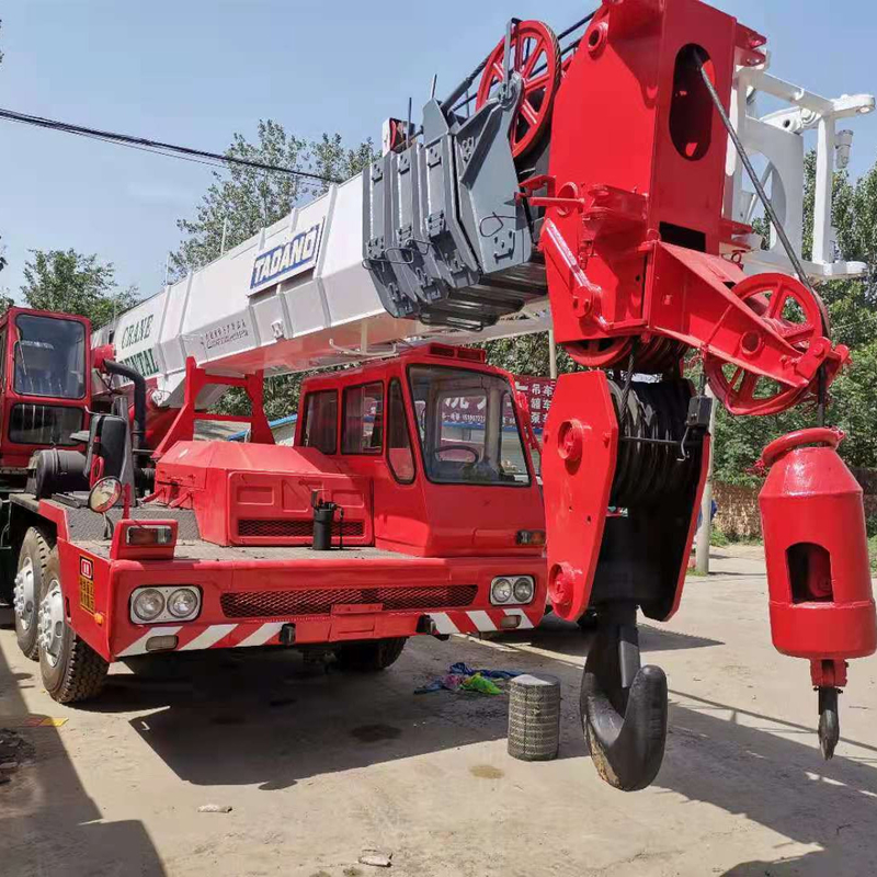 TG-500E grúa de camión grúa móvil QY25K QY25KA QY50KA QY50K QY70K QY70KA QY100K STC500 en Shanghai